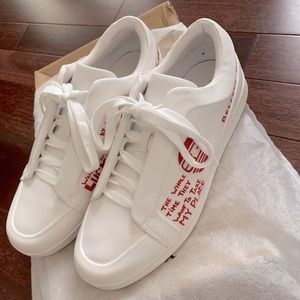 White Zara customized sneakers.